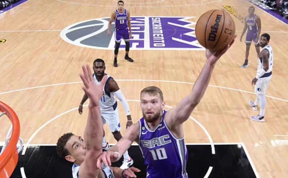 Kings slog Mavericks